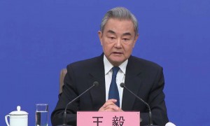 解放军台海军演越来越靠近台湾，两岸统一是否设定了时间表和路线图？王毅回应